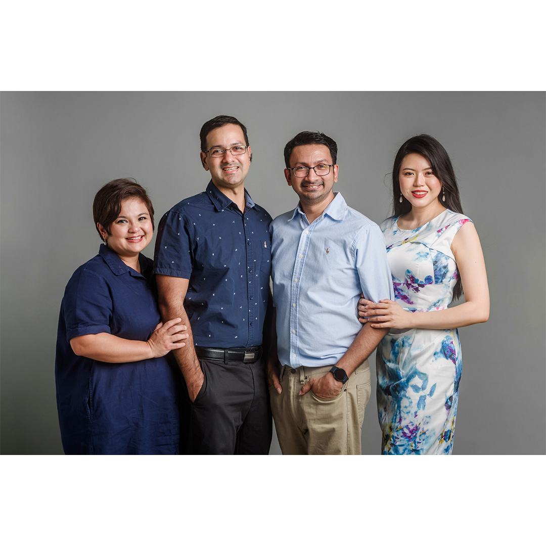 Studio Family portrait with plain timeless background